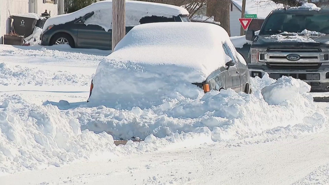 Columbus residents upset after plows block in cars with snow