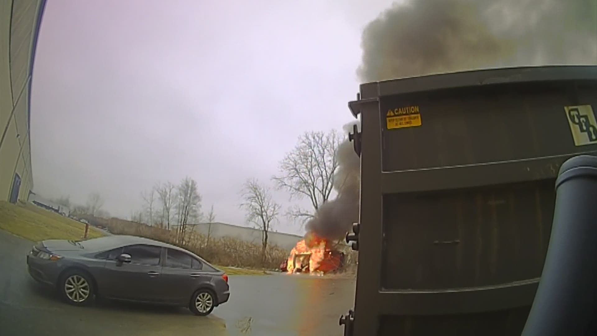Police body cameras and 911 calls shed more light on the fiery crash.