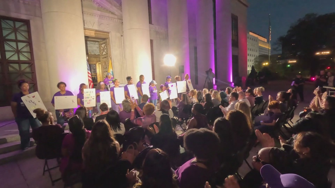 Columbus City Hall glows purple to honor domestic violence survivors ...