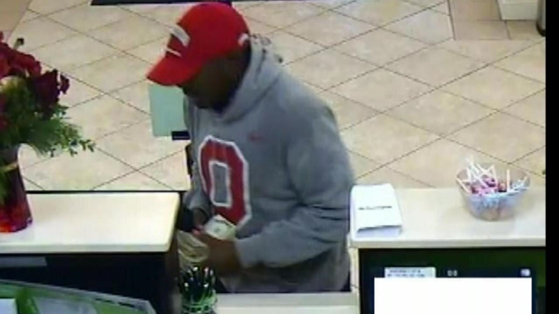 Dye Pack Explodes Following Bank Robbery, Suspect Flees Area