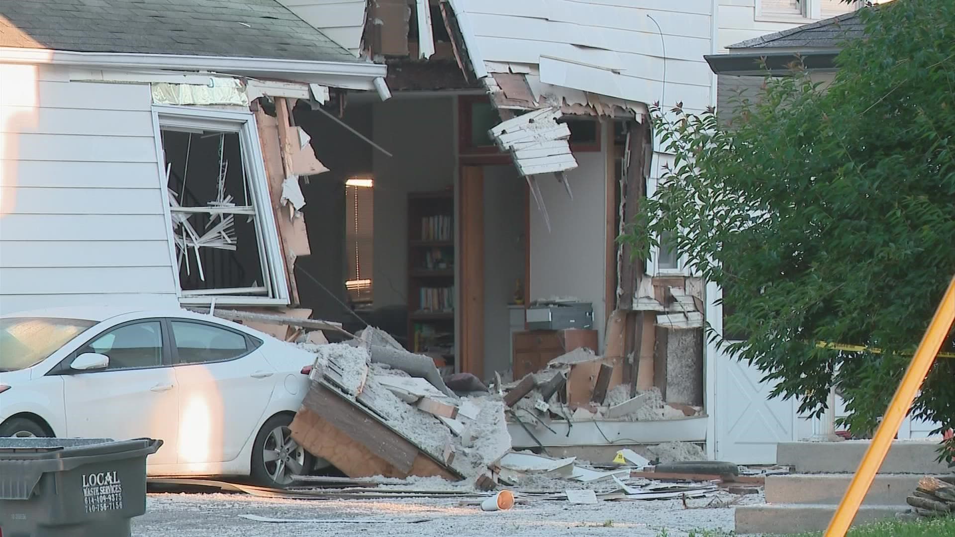 The car was traveling east on Trabue Road when it went off the road and crashed into the house. The car then exited the house before coming to a stop.