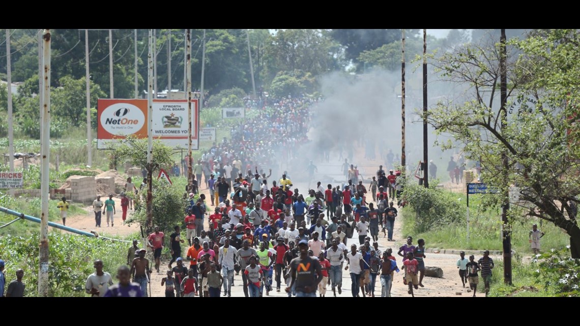 Police fire tear gas in Zimbabwe's capital at fuel protests