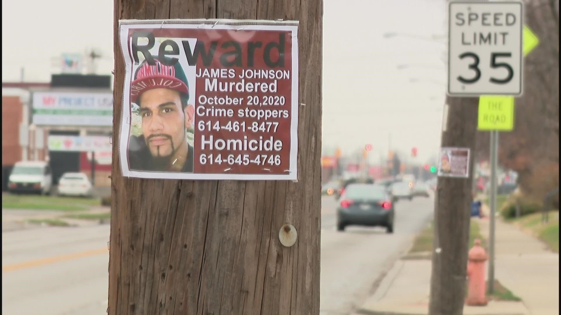 Brenda Johnson scattered posters of her son in the Hilltop area hoping someone will come forward with information about who killed him last year.