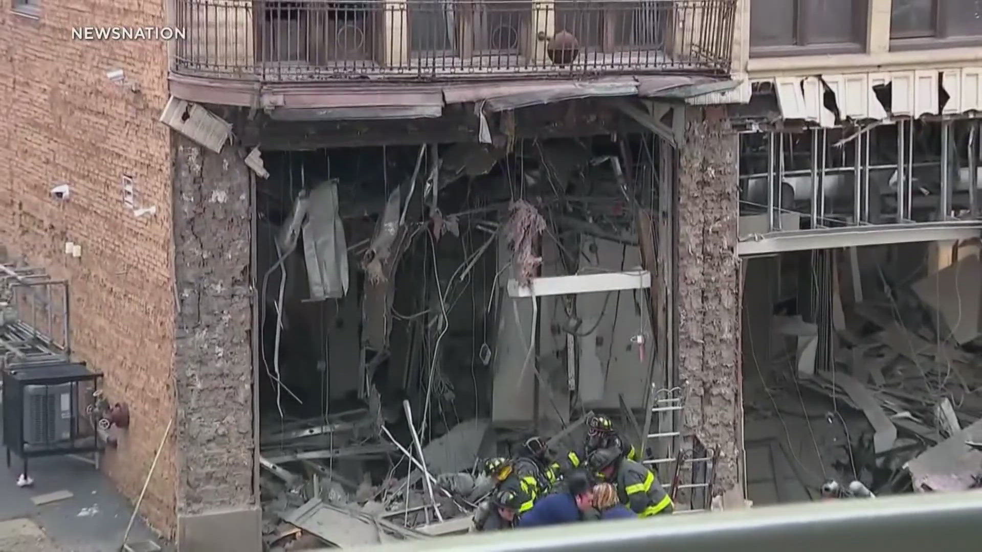 The 13-story building has a Chase Bank branch at street level and apartments in upper floors.