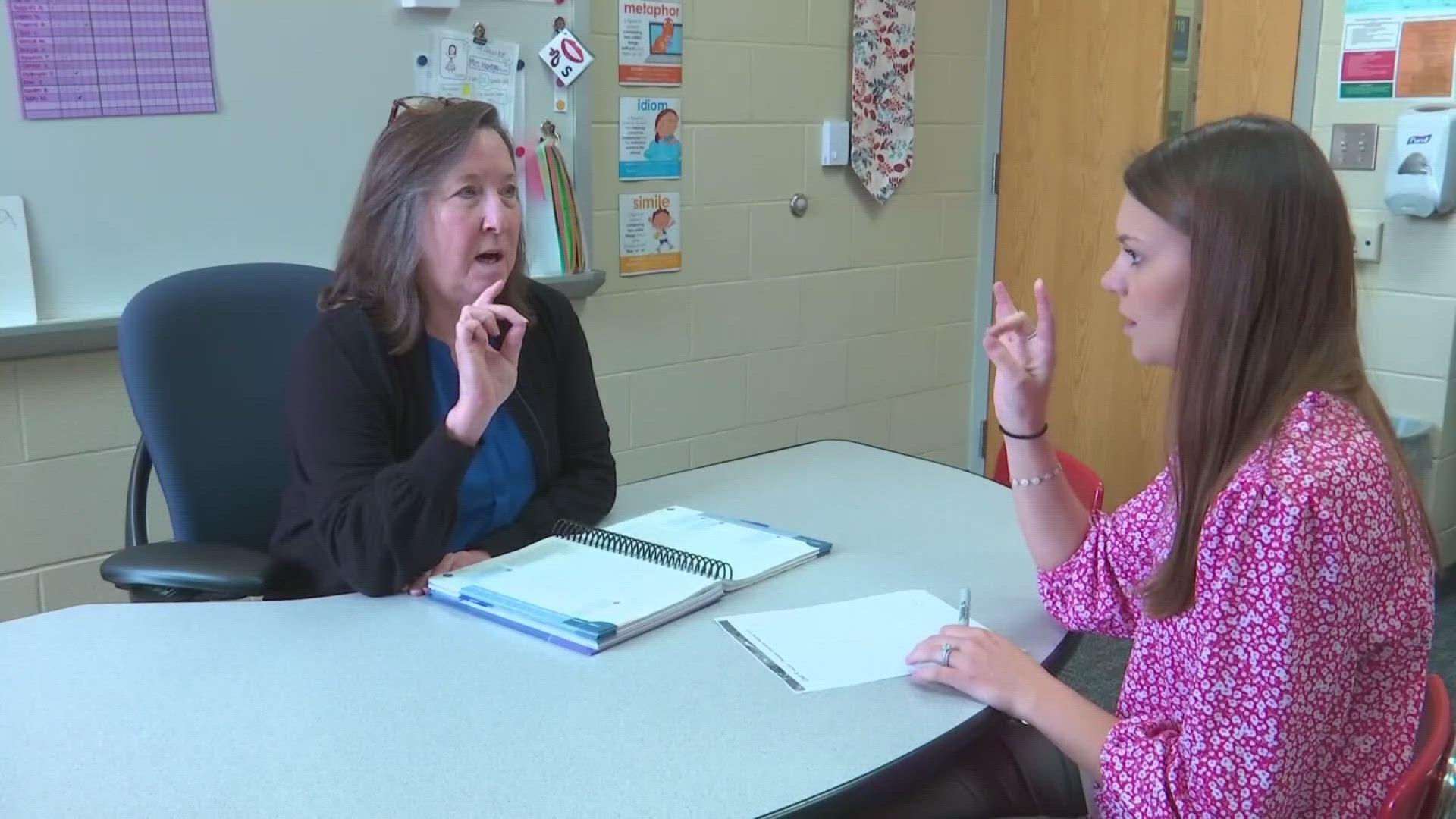 Ohio's two-year budget includes $18 million to fund 100 literacy coaches.