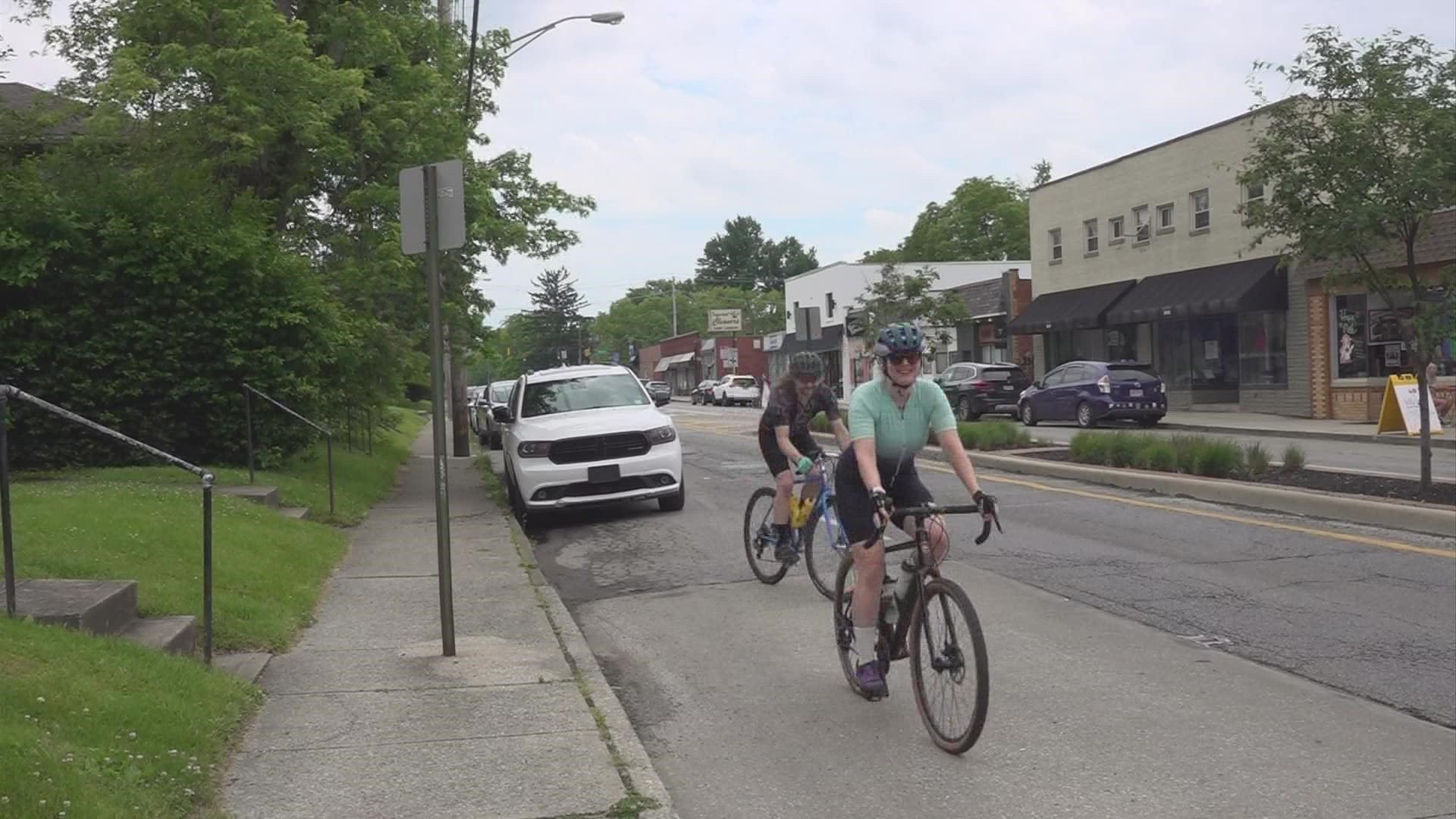 The new plan makes way for seven miles of continuous bike lanes on both sides of the street.