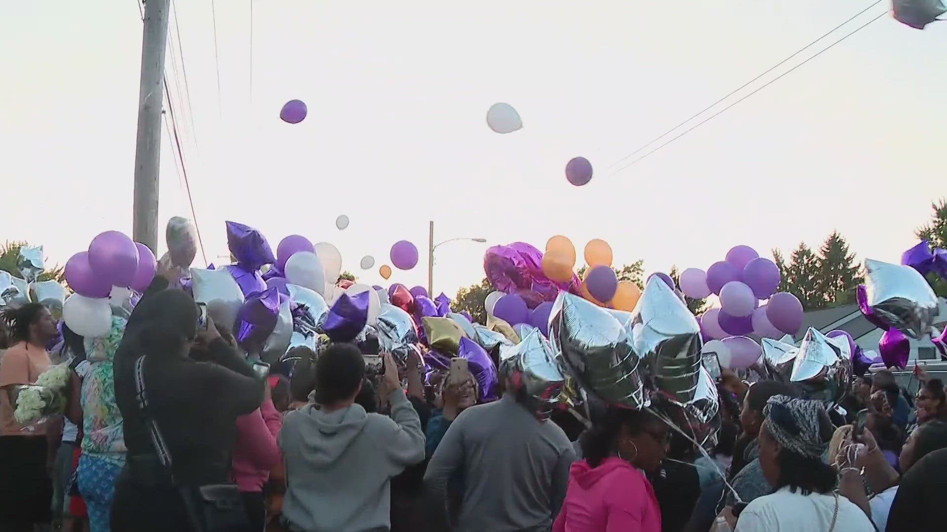 The community’s love for Deandra was on full display at the vigil as more than 100 people came together with balloons and candles.