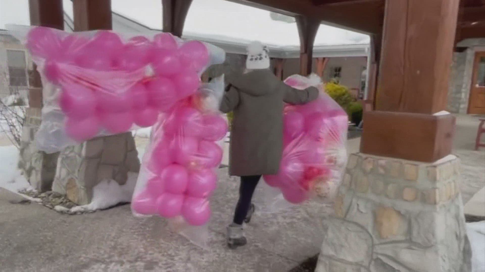 A local group delivered balloon bouquets to help spread some love this holiday weekend.