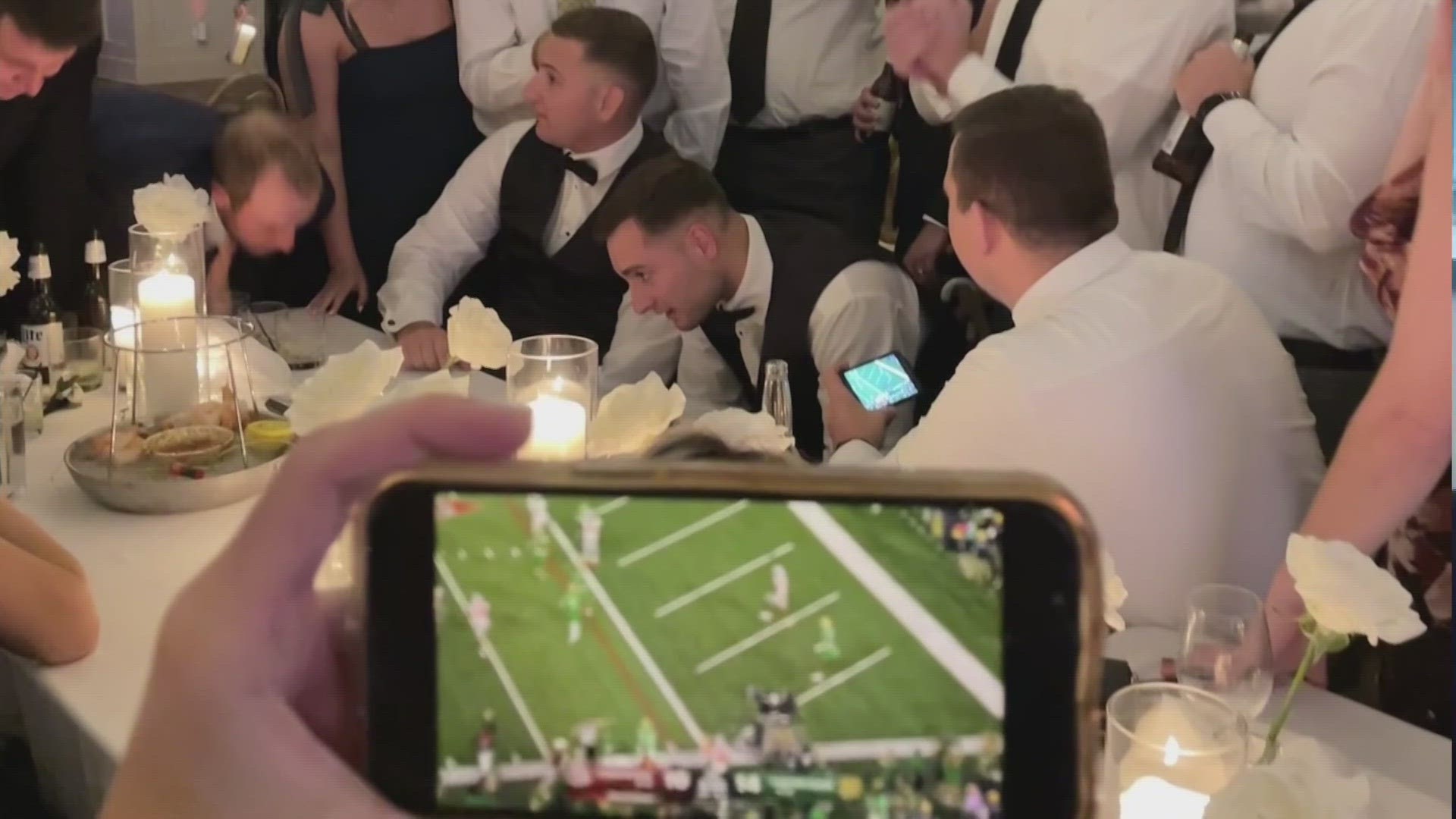 Two Buckeye fans who were married the same day as the Ohio State-Notre Dame game talk about their "incredible" reception after video goes viral.