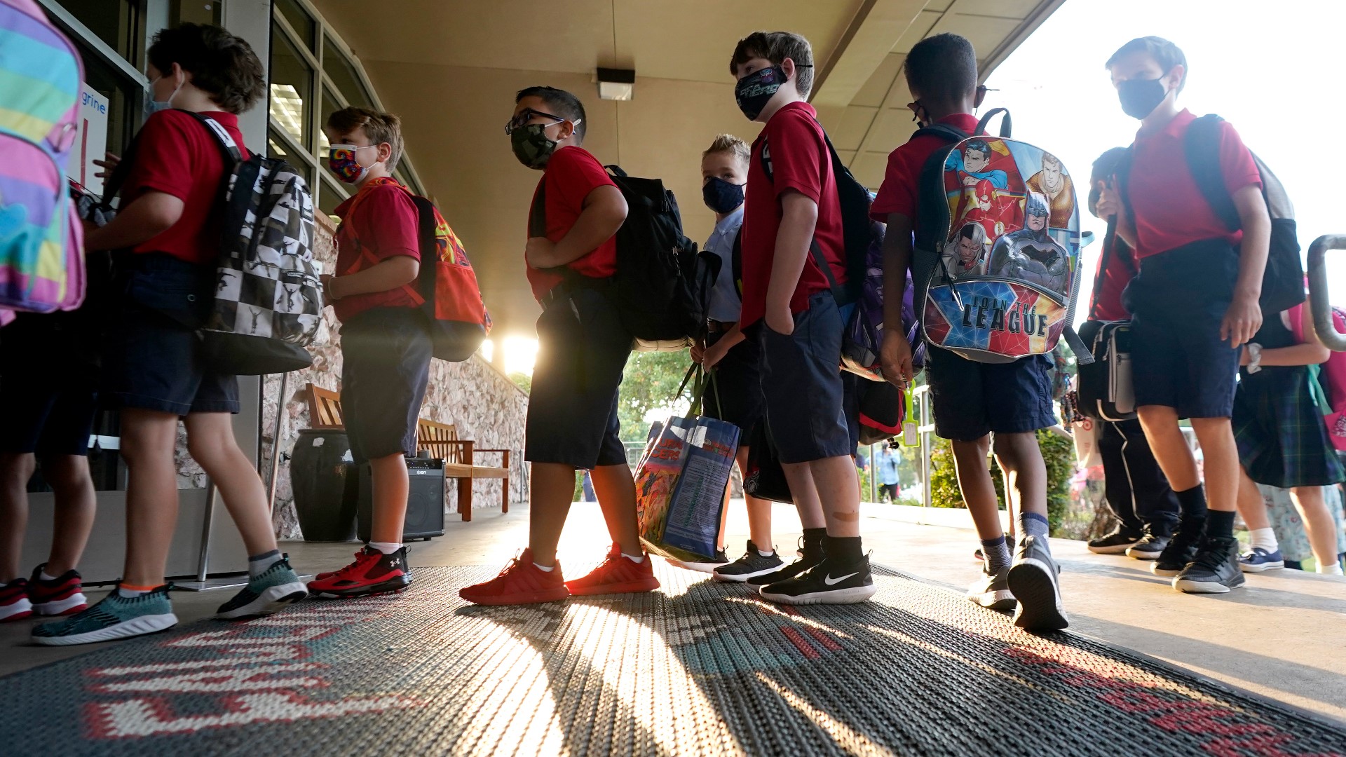 The school's board of education voted to drop the mandate and masks will be optional once classes resume on Jan. 4.