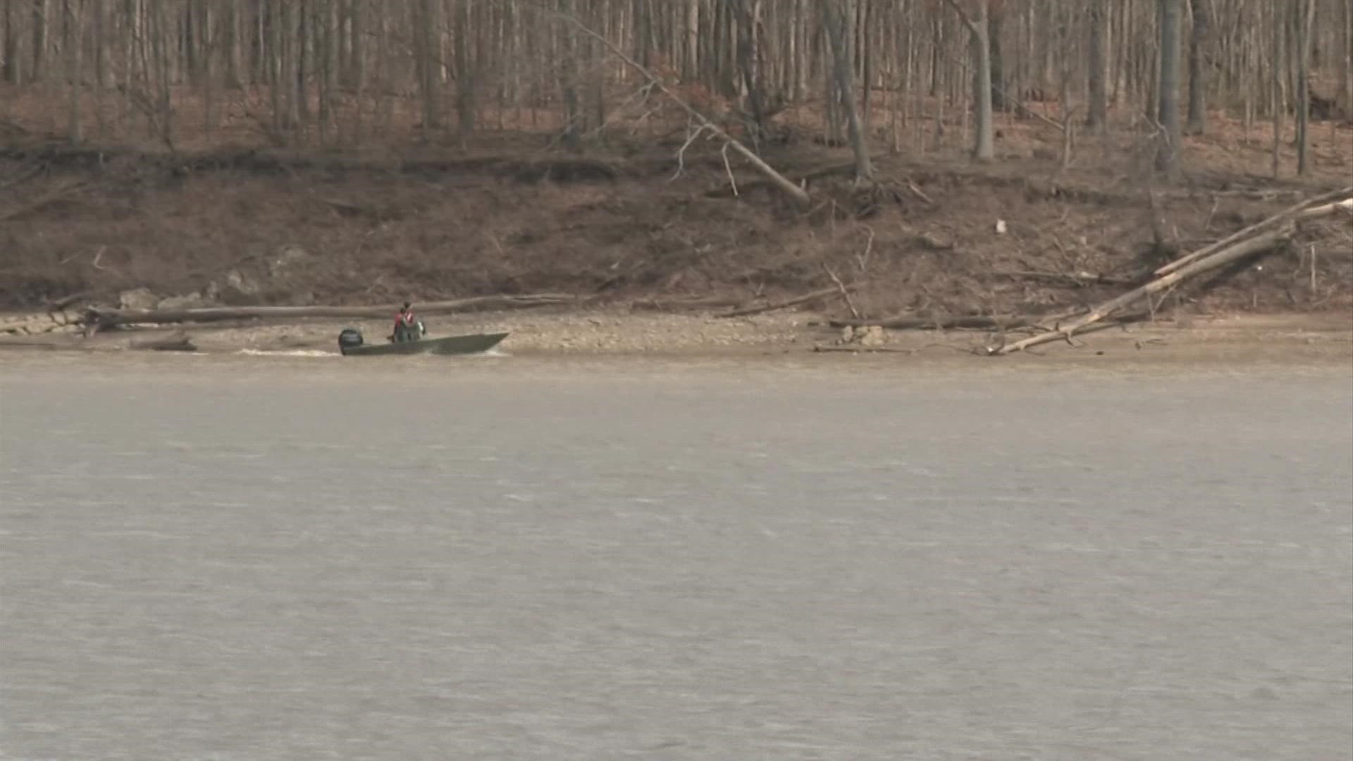 Dispatchers say a man called 911 after he and his brother were fishing and their boat sank.