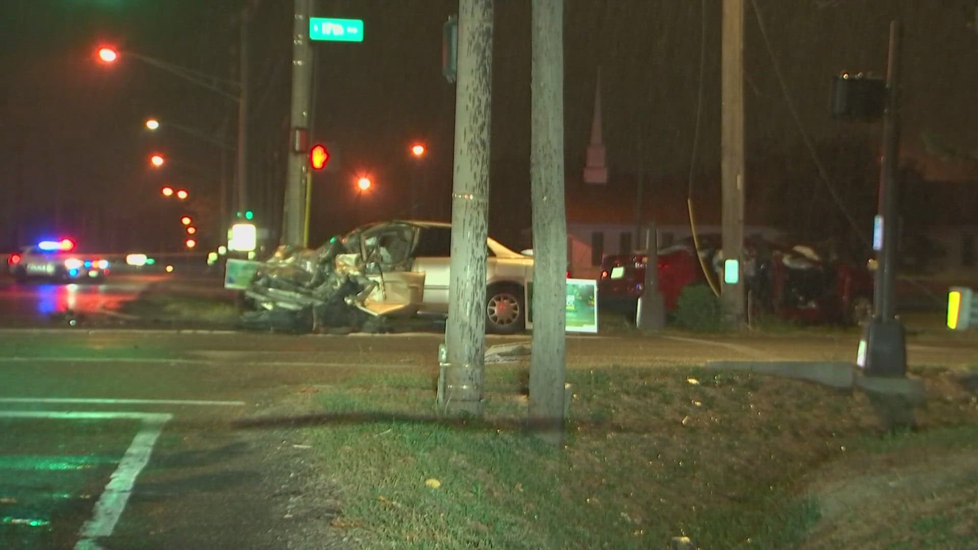 A woman is dead and two other people are injured after a two-vehicle crash in northeast Columbus early Tuesday morning, police said.