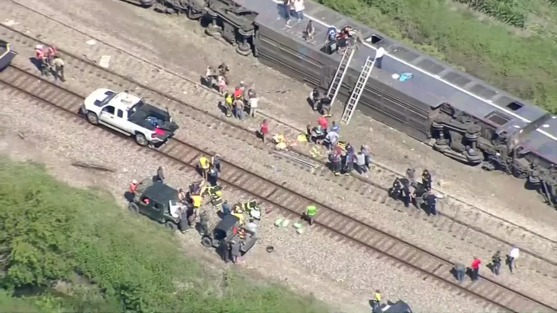 An Amtrak passenger train traveling from Los Angeles to Chicago struck a dump truck Monday in a remote area of Missouri, killing three people and injuring dozens.