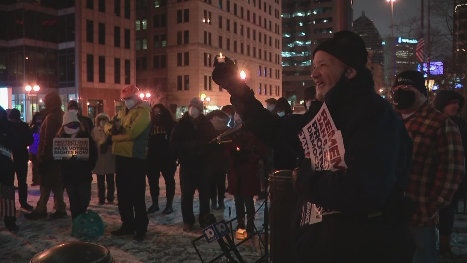 A group of about 100 people gathered outside the Statehouse Thursday evening.