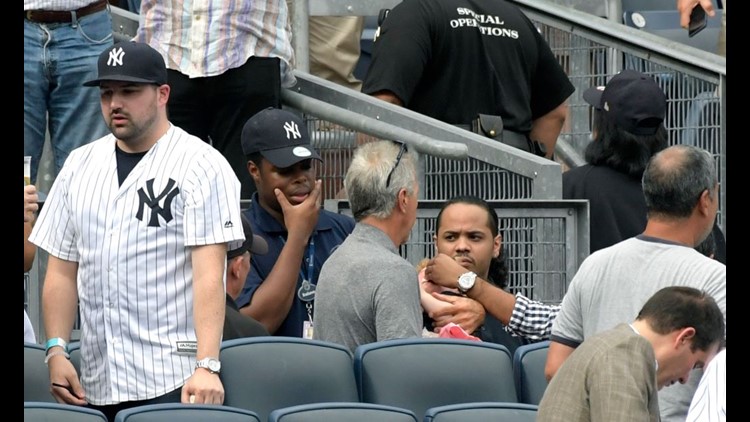 Yankees Fan Falls Out of Stands Trying to Get Foul Ball