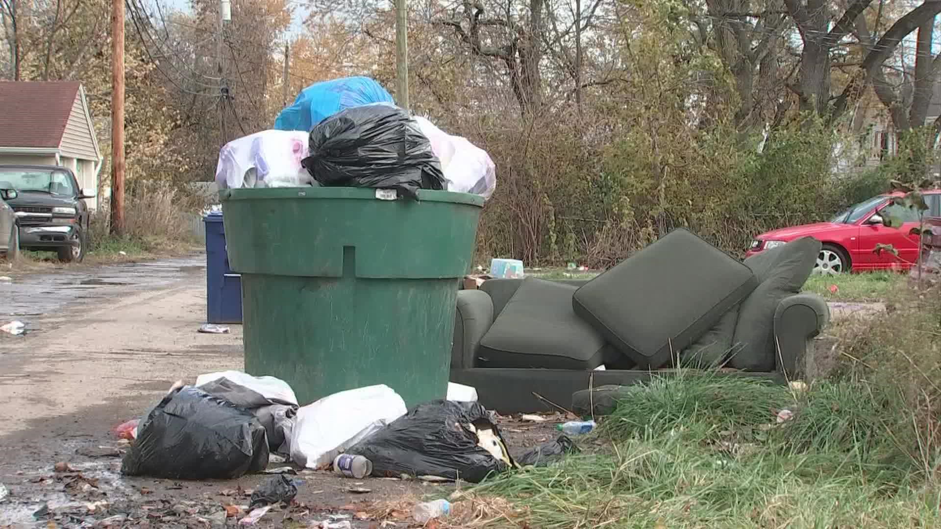 The city said people will illegally fill the 300-gallon dumpsters seen in public, which leads to problems when the garbage spills over.