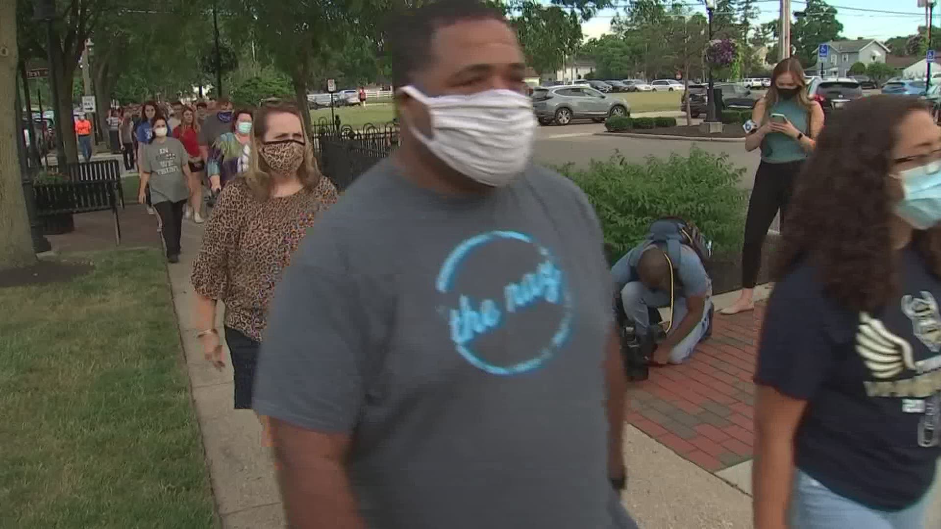 After about an hour of singing and praying, the group marched back down the street where it ended the night by praying in front of the Grove City Police Department.