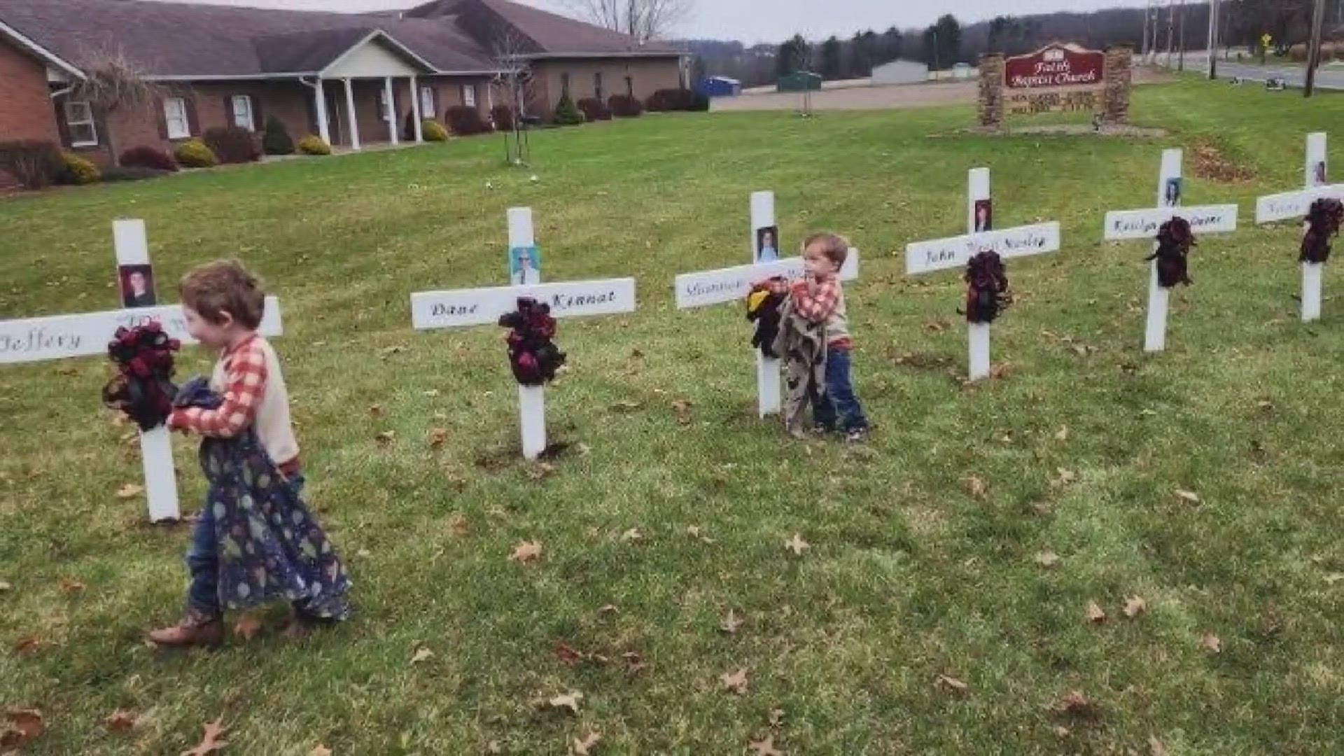 Six white crosses now sit down the road from the Tuscarawas Valley High School to honor those killed in a bus crash on I-70.