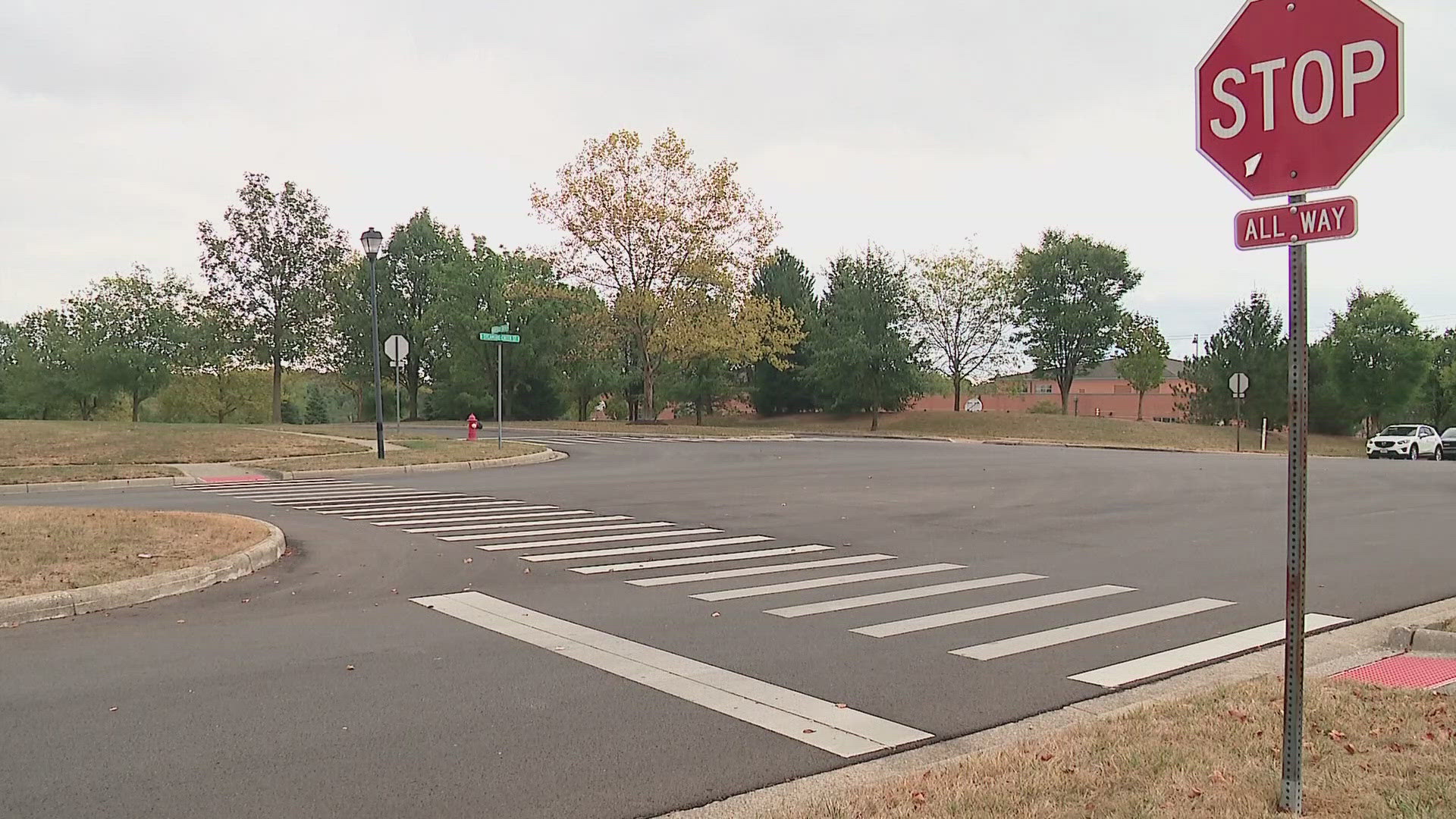 A close call at an intersection by a Pickerington elementary school has a parent calling for change in the neighborhood.