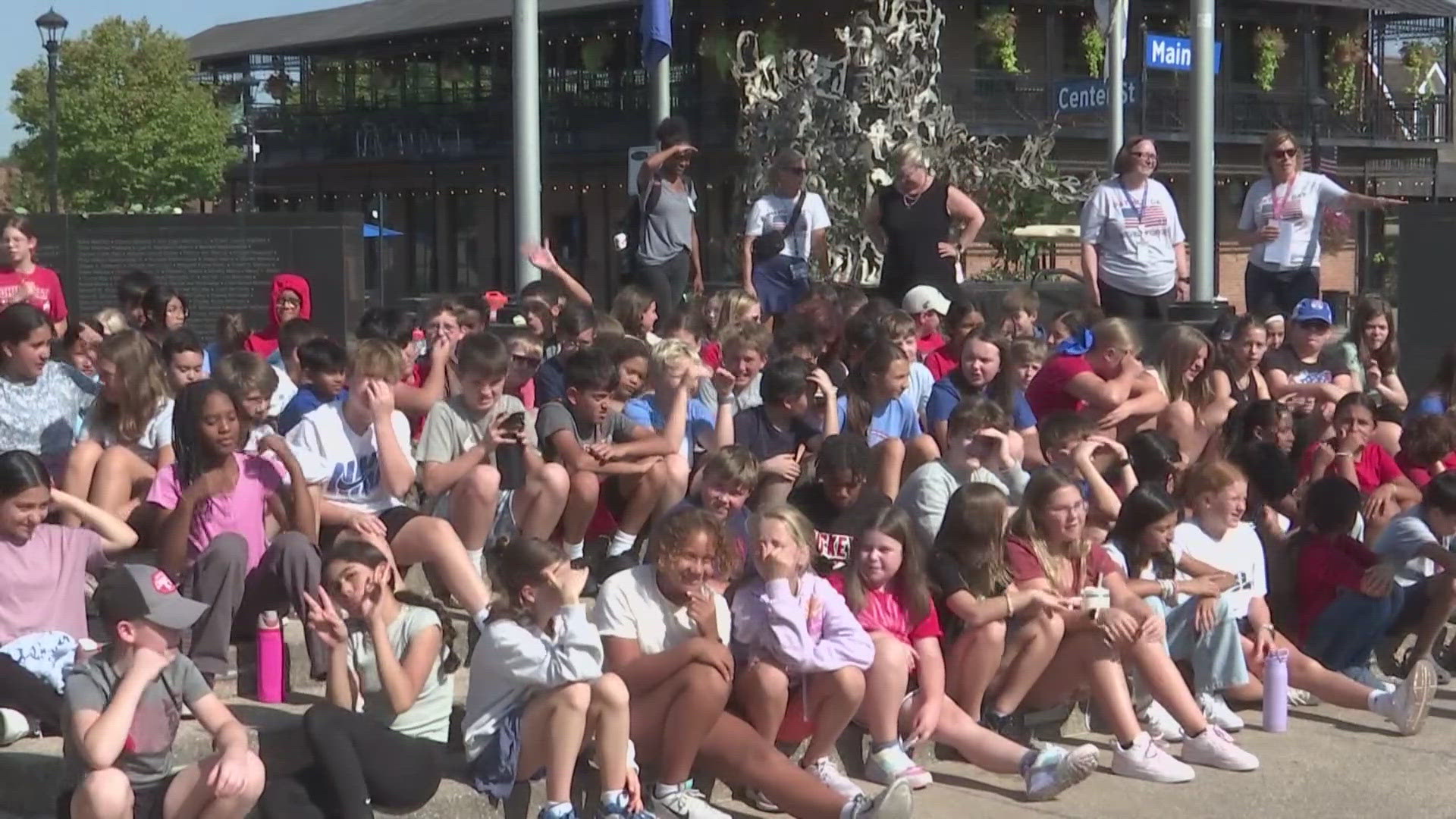 Hilliard Station 6th graders observed the memorial wall at First Responders Park.