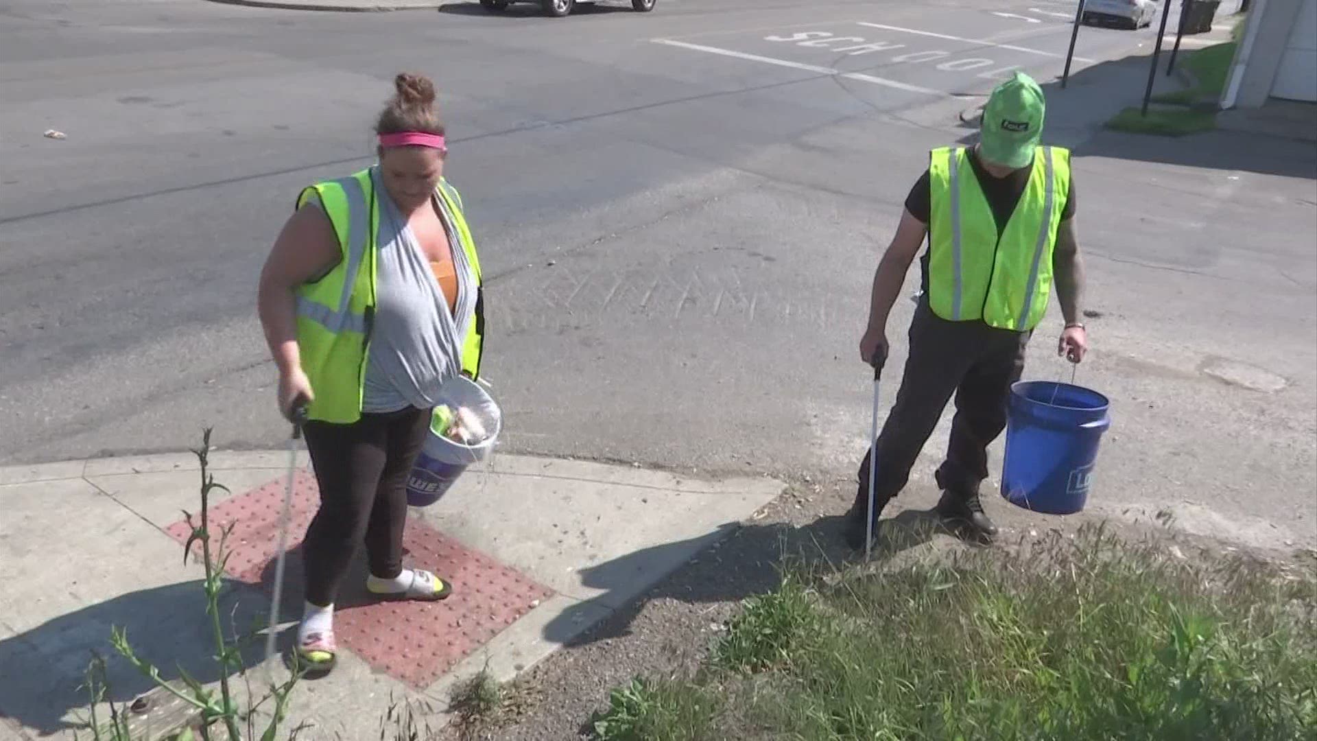 Local residents get paid to help clean up neighborhoods.