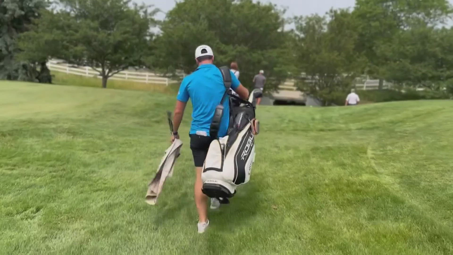 Less than 24 hours after winning the Memorial, Viktor Hovland put down the trophy and picked up the bag to caddie for his college teammate in a U.S. Open qualifier.