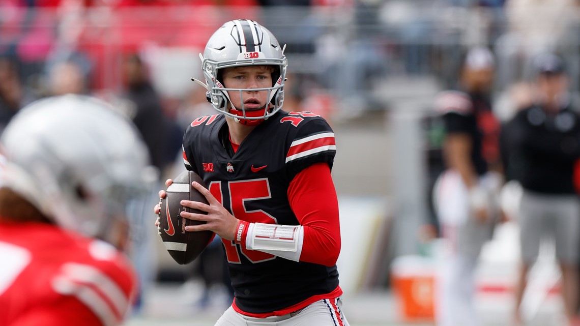 Download Ohio State quarterback Justin Fields delivers a pass