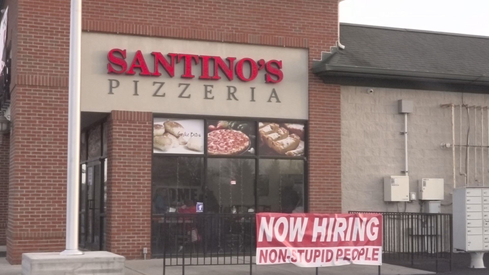 Santino’s Pizzeria manager, Heather Stockton says the shop put up two signs reading “Now Hiring Non-Stupid People,” a few months ago.