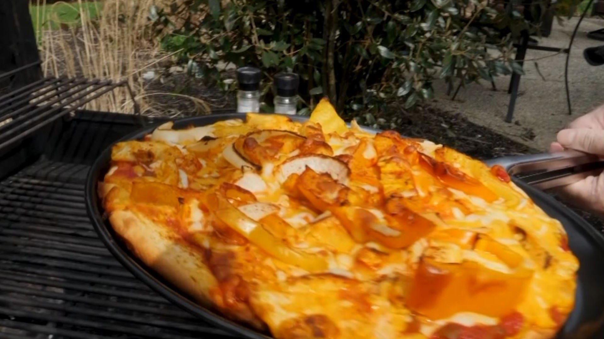 Dom Tiberi makes a Southwestern-style pizza on the grill.