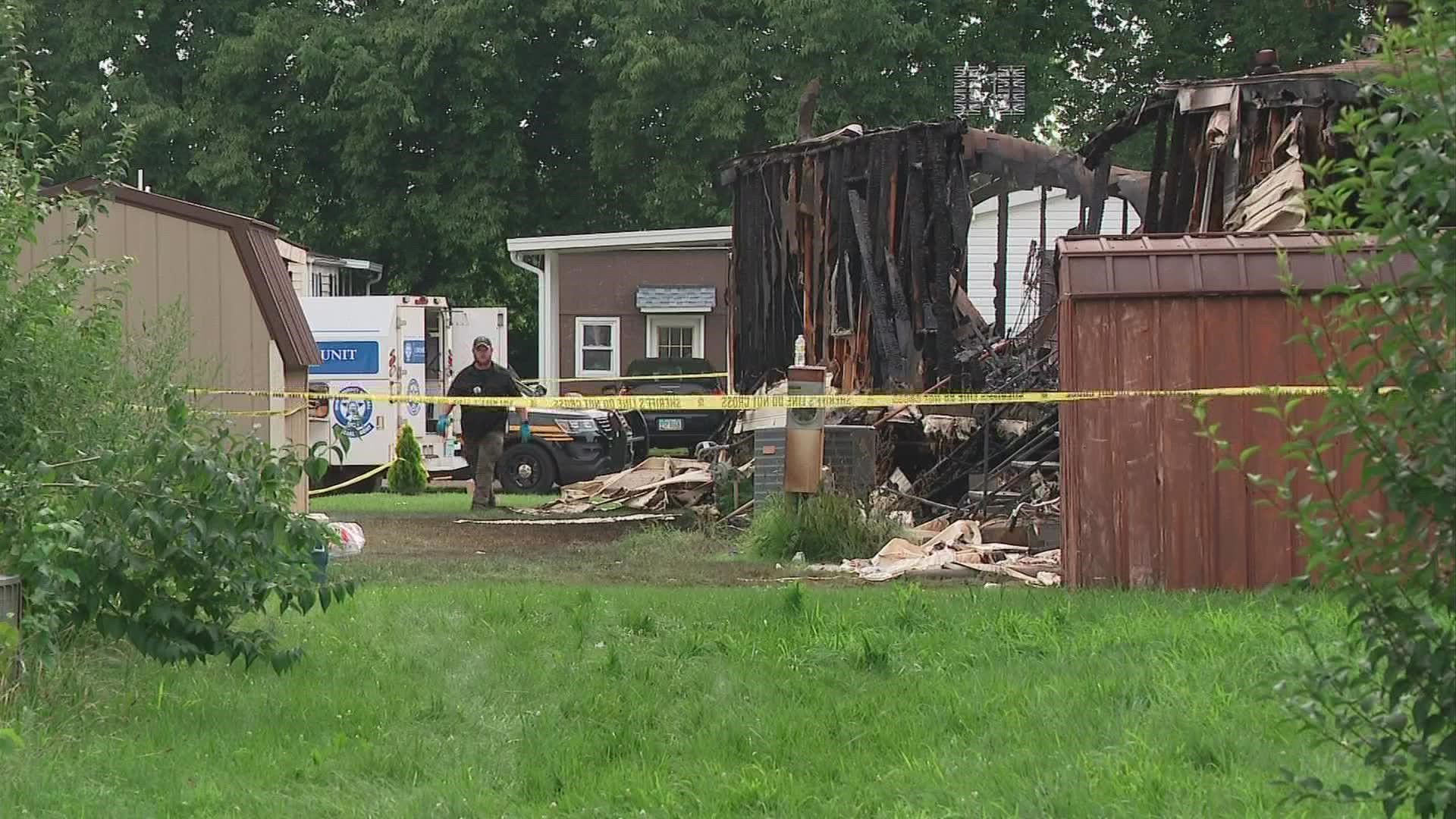 Authorities have confirmed that two bodies were recovered from a mobile home following a blaze and gunfire that killed a sheriff’s deputy over the weekend.