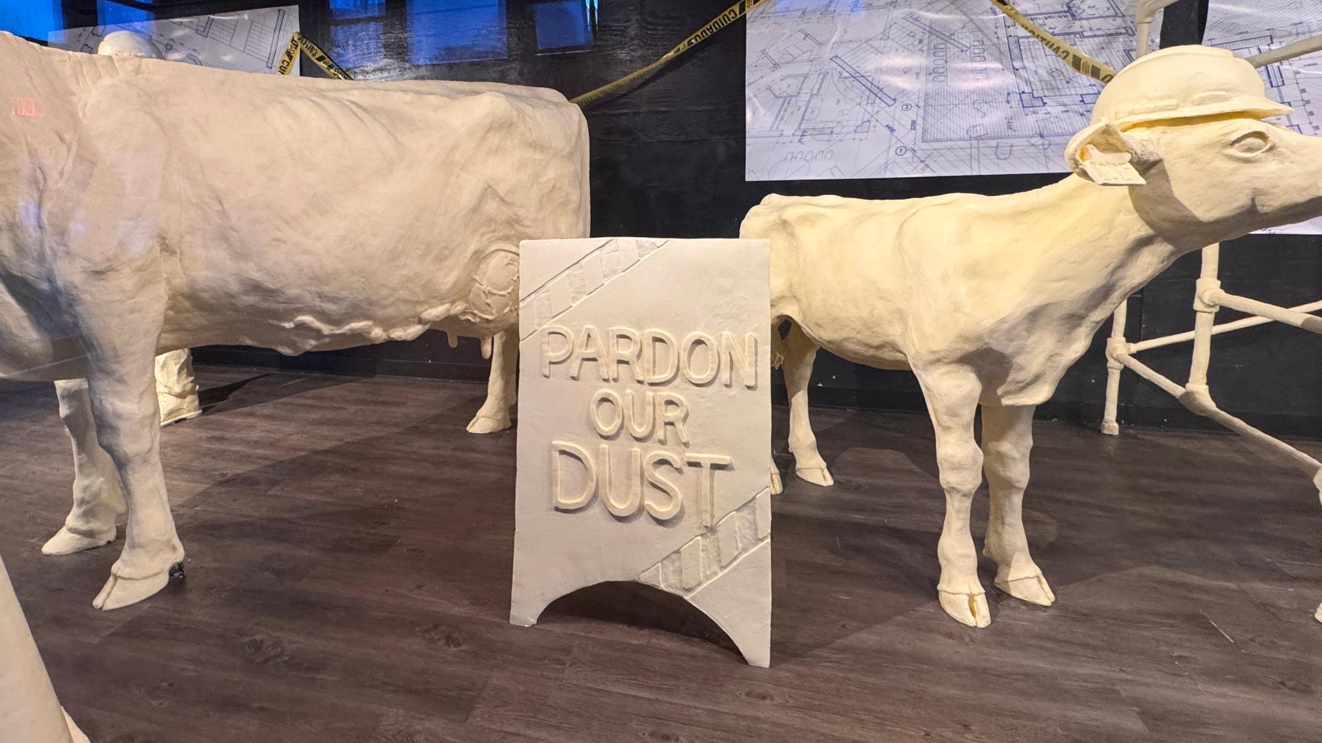 This year's butter display comes with a simple message to fairgoers: Pardon Our Dust.