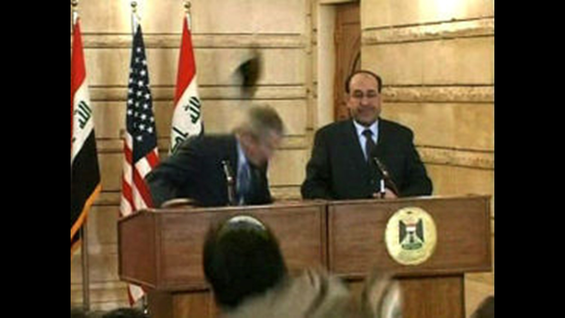 Reporter Throws Shoe At Bush During Iraq Visit