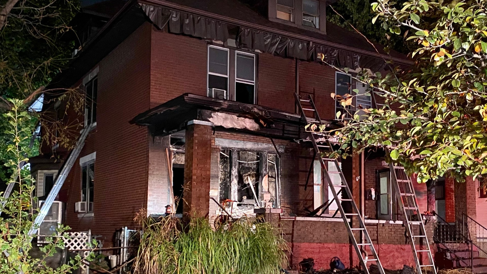 A woman is in serious condition after a fire broke out on the porch of a home in the Hilltop neighborhood Tuesday morning.