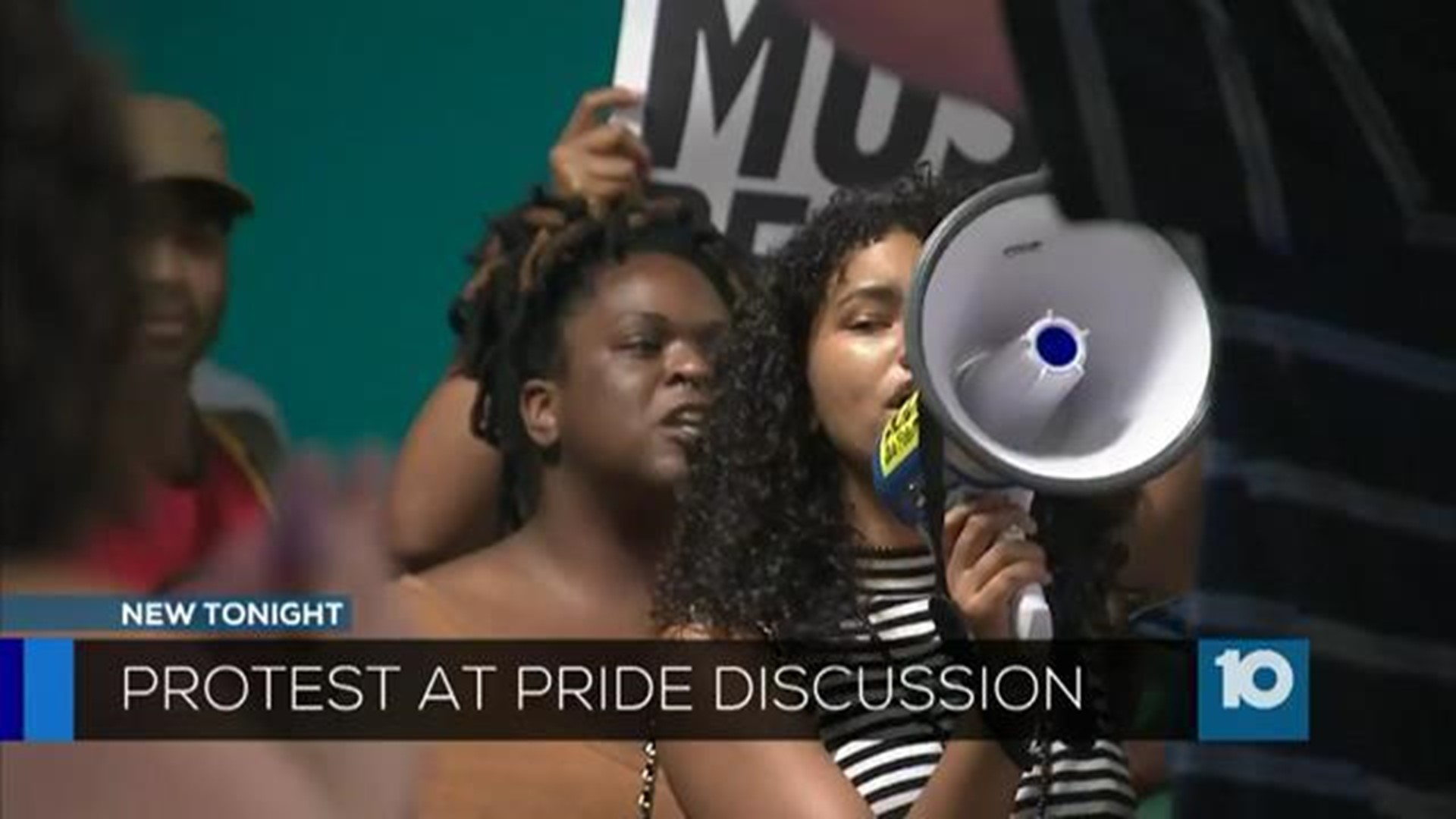 Protesters interrupt pride discussion