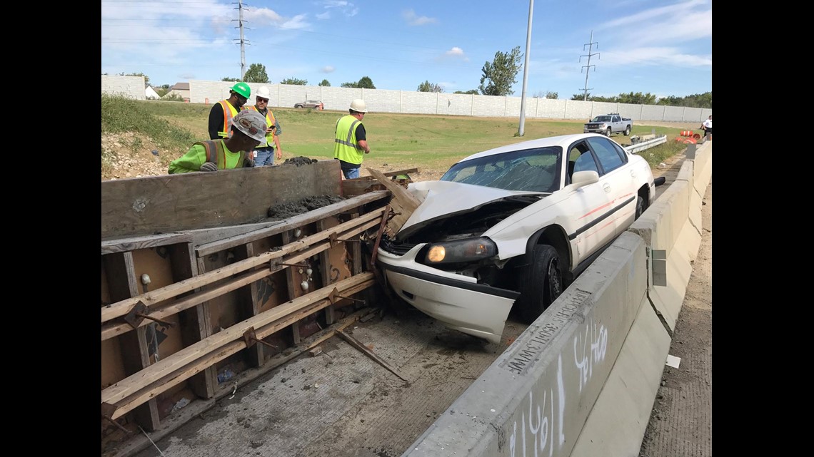 Construction worker injured after car crashes into work zone in west ...