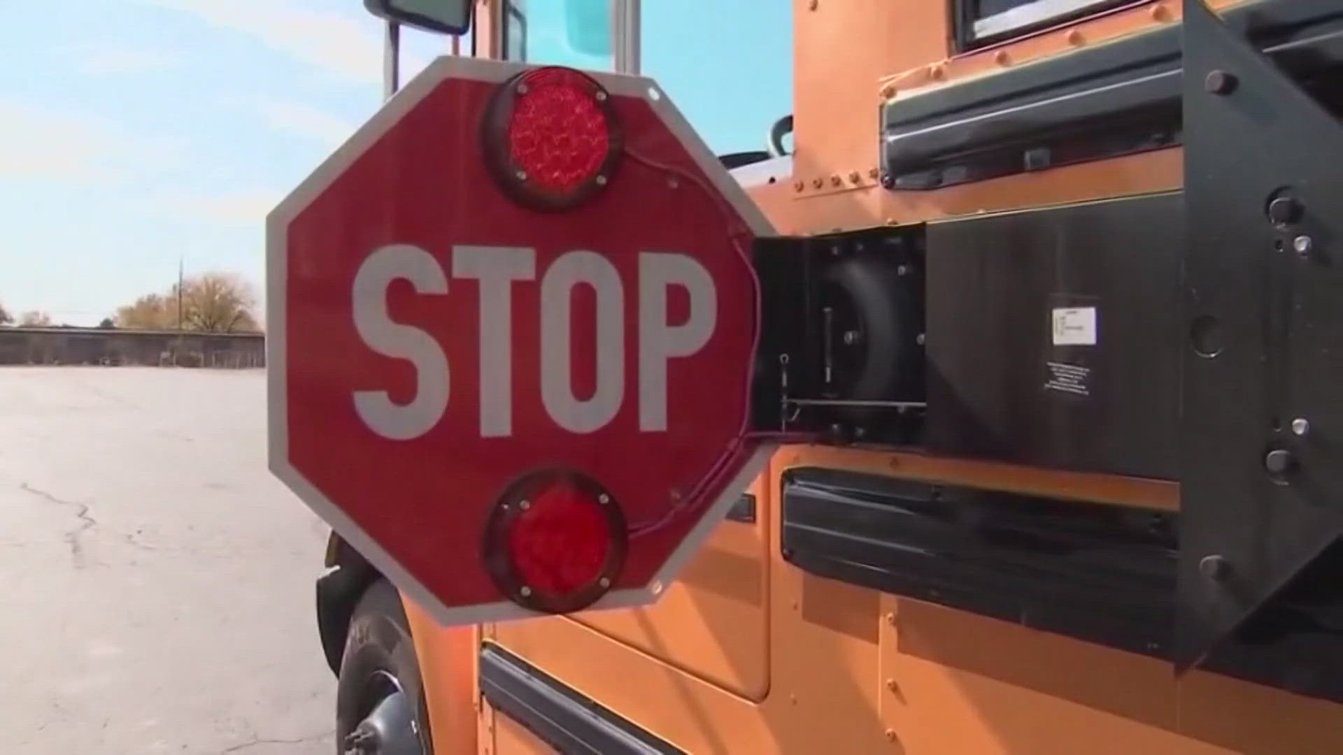 Ohio law requires drivers to stop for a stopped school bus if they are driving behind the bus.