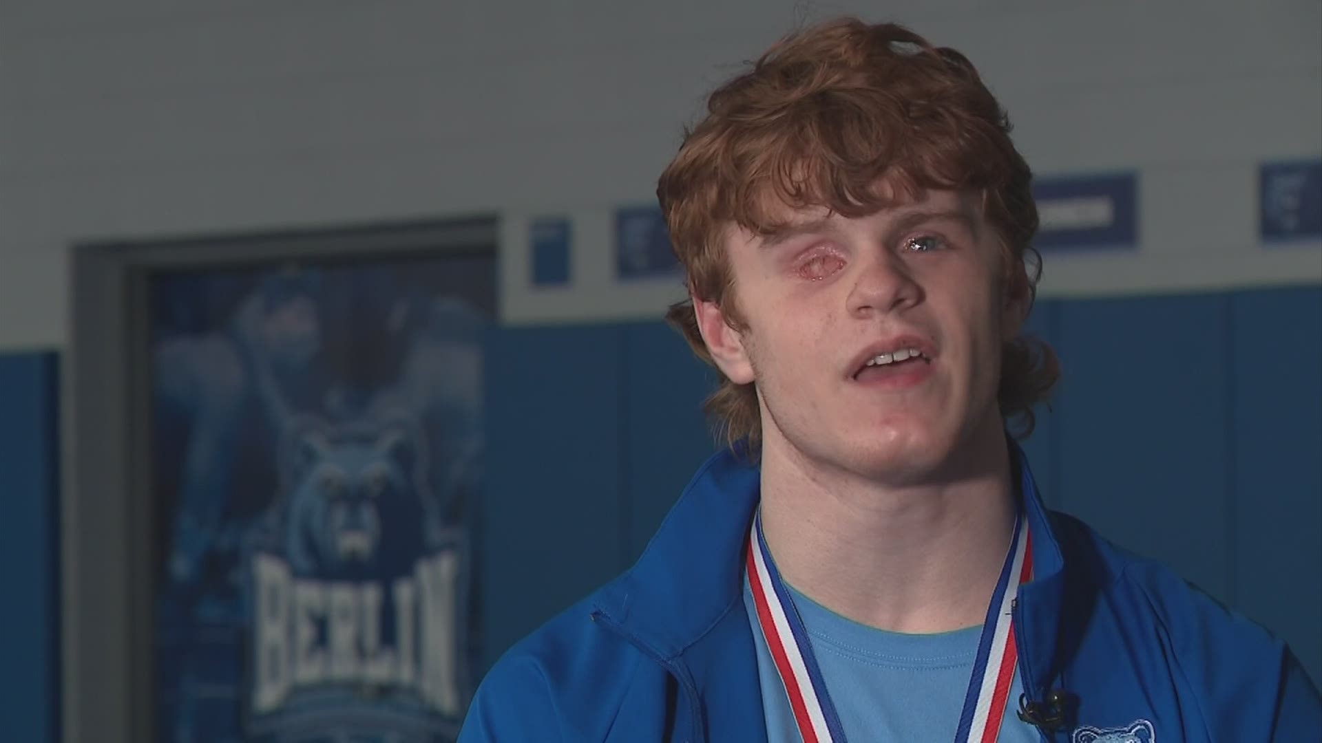 Caiden Hooks had both of his eyes removed when he was four years old after a battle with cancer. Now, he's competing in the state wrestling tournament.