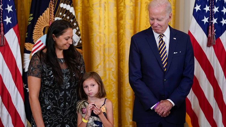 Ohio widow, daughter  stand alongside President Biden as he signs Pact Act into law