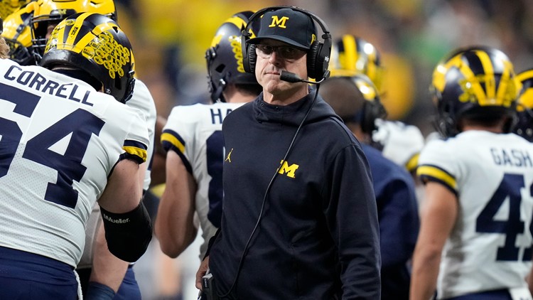 Michigan Wolverines' Jim Harbaugh interviewing with Minnesota Vikings