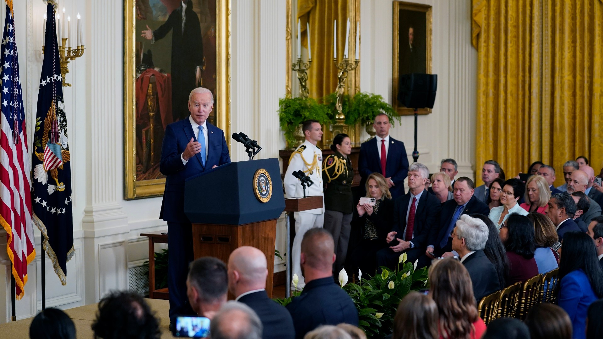 Biden told the crowd the award was given for “actions above and beyond the call of duty,” singling out the families of the officers to thank them.