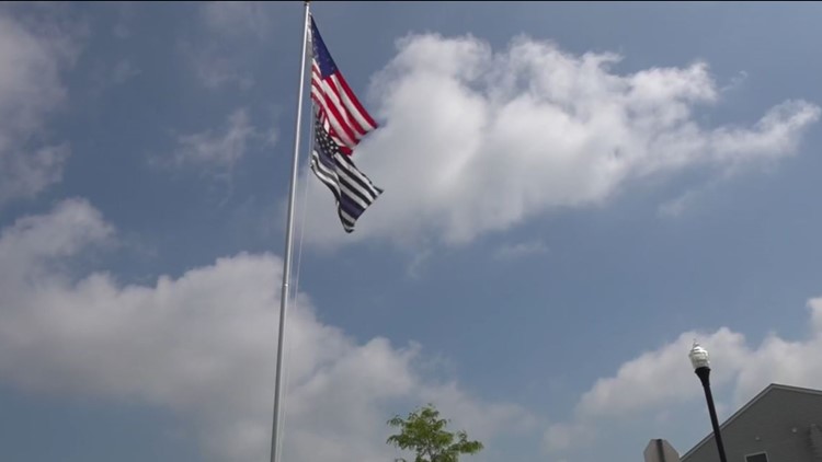 Father of murdered Kirkersville police chief told to remove police flag from front yard