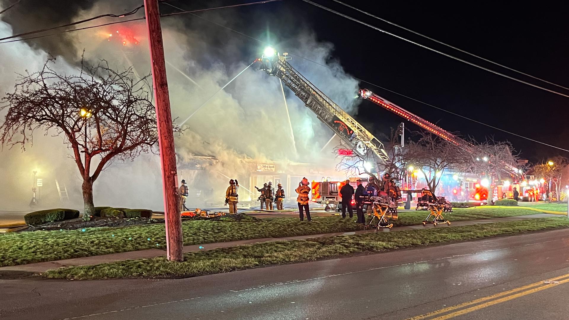Firefighters spent hours battling a large fire affecting six businesses in a strip mall in Worthington Friday morning.