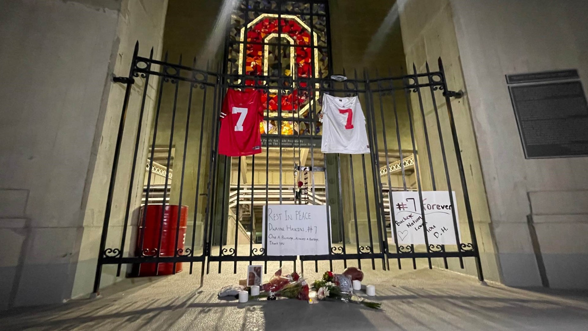 The memorial features two #7 jerseys, flowers and signs remembering for Buckeye standout.