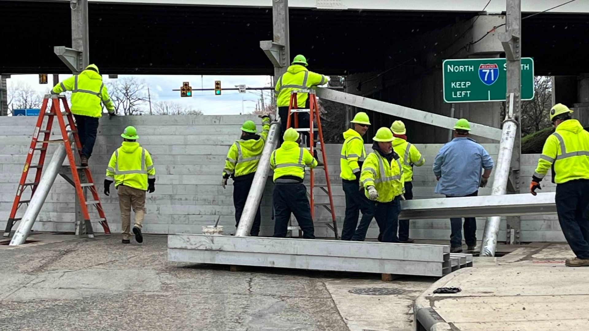 One wall was installed at Greenlawn Avenue near Interstate 71 and the other was installed at Harmon Avenue near Frank Road.