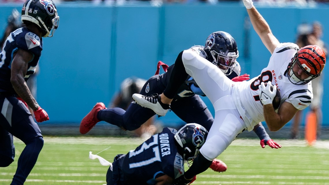 Henry runs for TD, throws for score as Titans rout Bengals