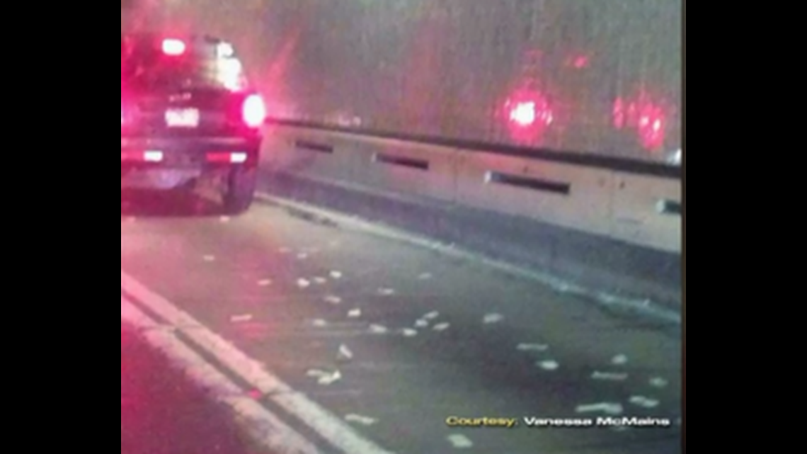 Armored Truck Spills Cash Inside Highway Tunnel