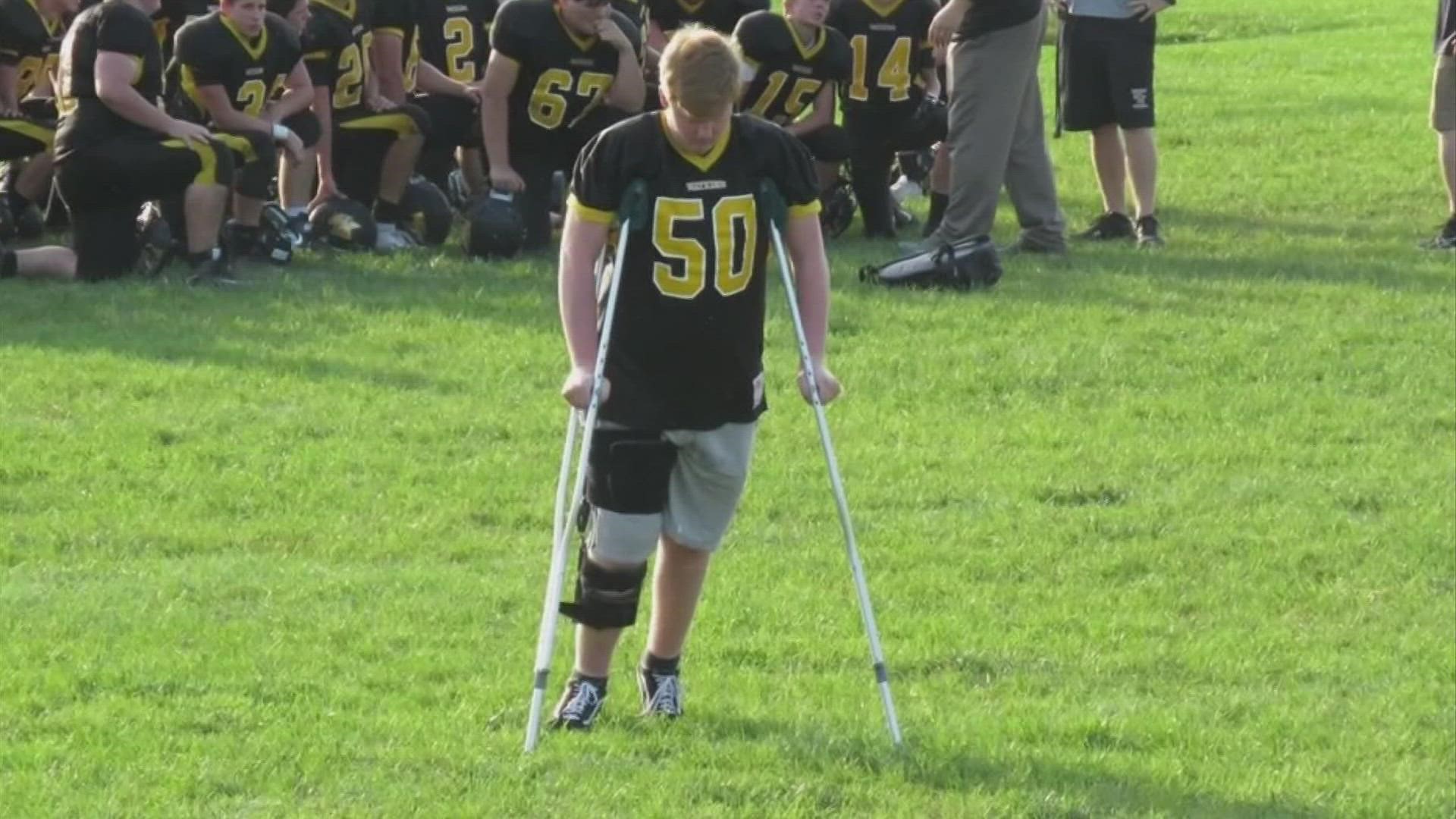 Jacob Joyce, a senior at Watkins Memorial High School, went against the odds to continue playing with his football team.