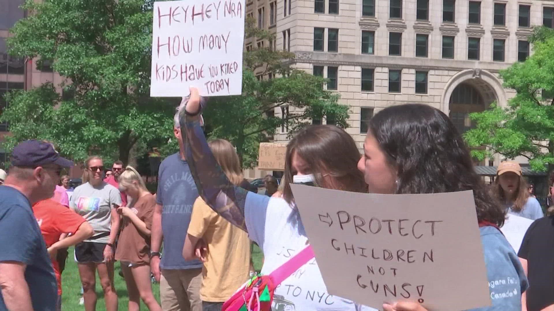 The people who gathered want legislators to pass legislation to prevent gun violence.