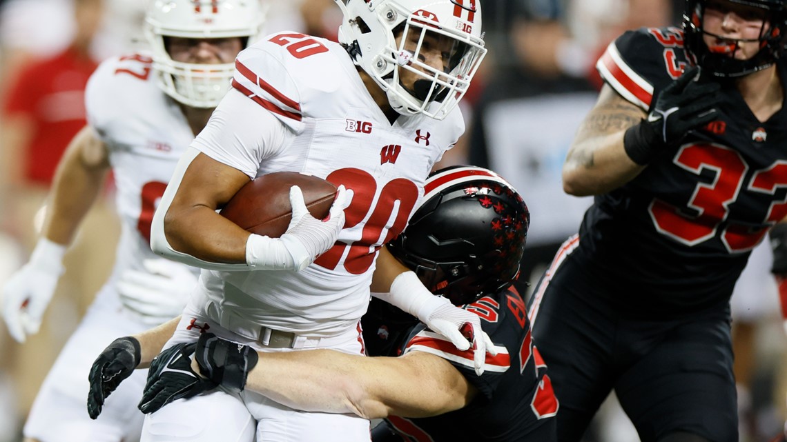 No. 3 Buckeyes score early and often, bury Wisconsin 52-21