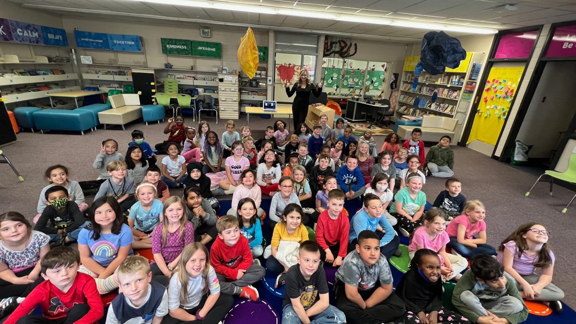 Ashlee and Jeff Booth talked to first and second-grade students on Tuesday about how they predict the weather, why the sky is blue and weather experiments.